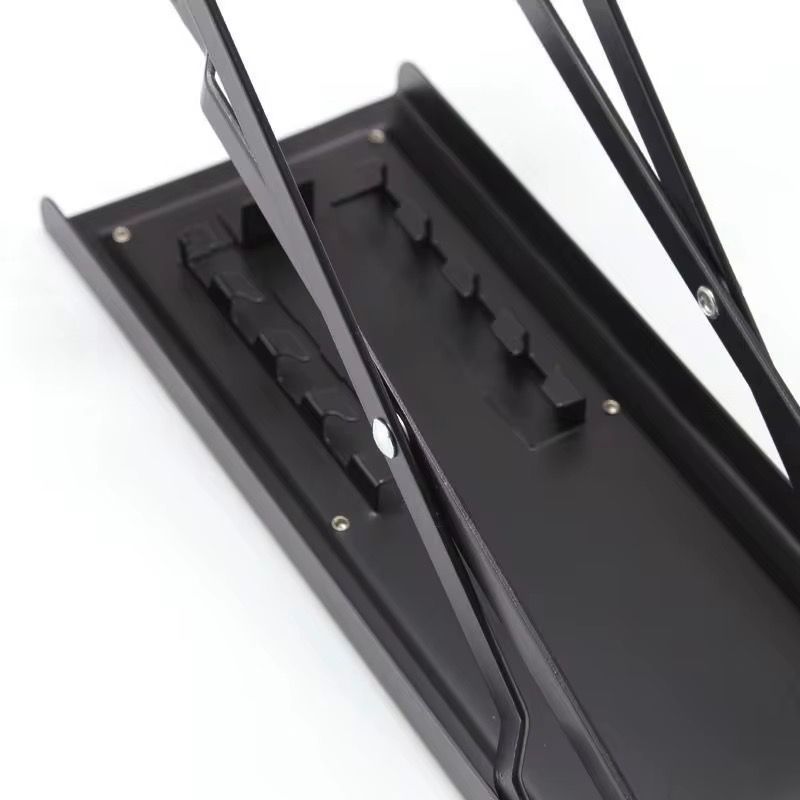 Apoya pies plegable negro