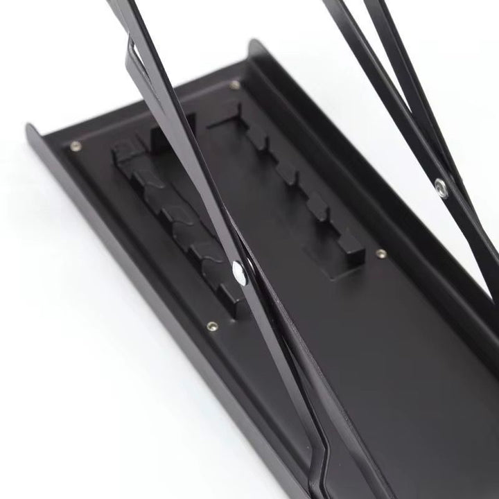 Apoya pies plegable negro