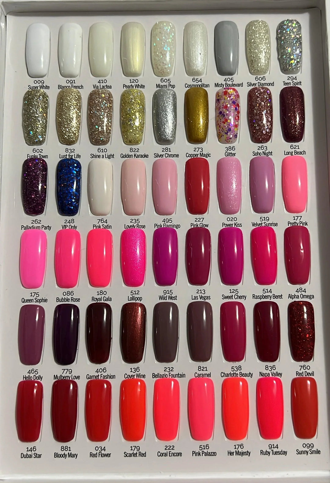 Muestra de 40 colores de esmaltes semipermanentes Crystal Nails con tonos blancos, dorados, rosas, rojos y glitter