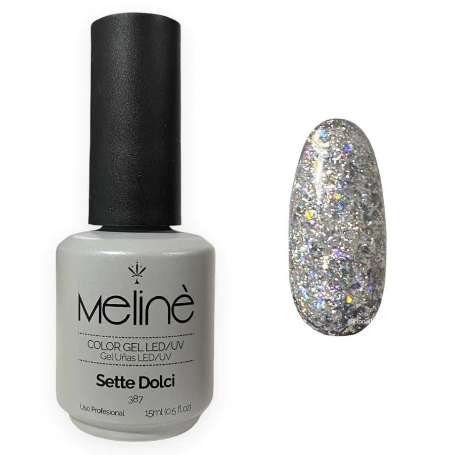Esmalte semipermanente Meline color gel Sette Dolci 387 con muestra de uñas con brillo holográfico plateado